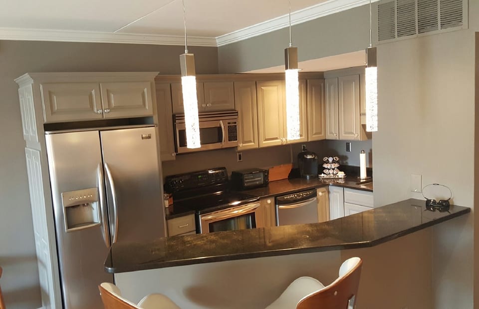 Frig with icemaker and water dispenser, stove, microwave, toaster and coffee pot