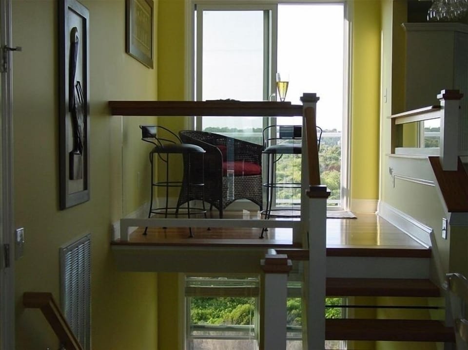 Looking across raised sitting area to back deck