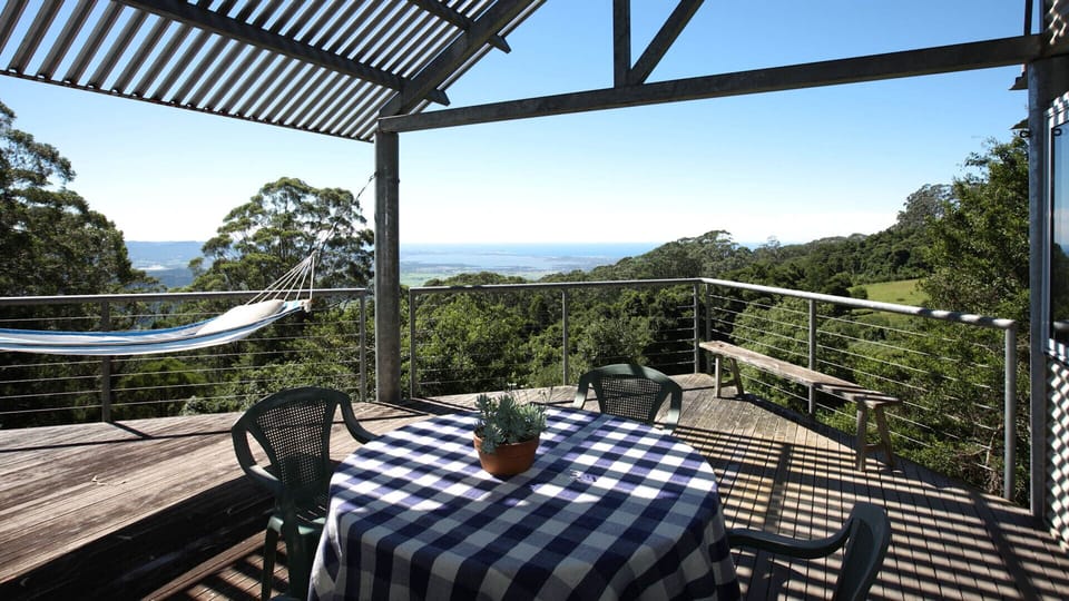 Second deck with hammock and outdoor setting, adjoining Bedroom 1 sitting area