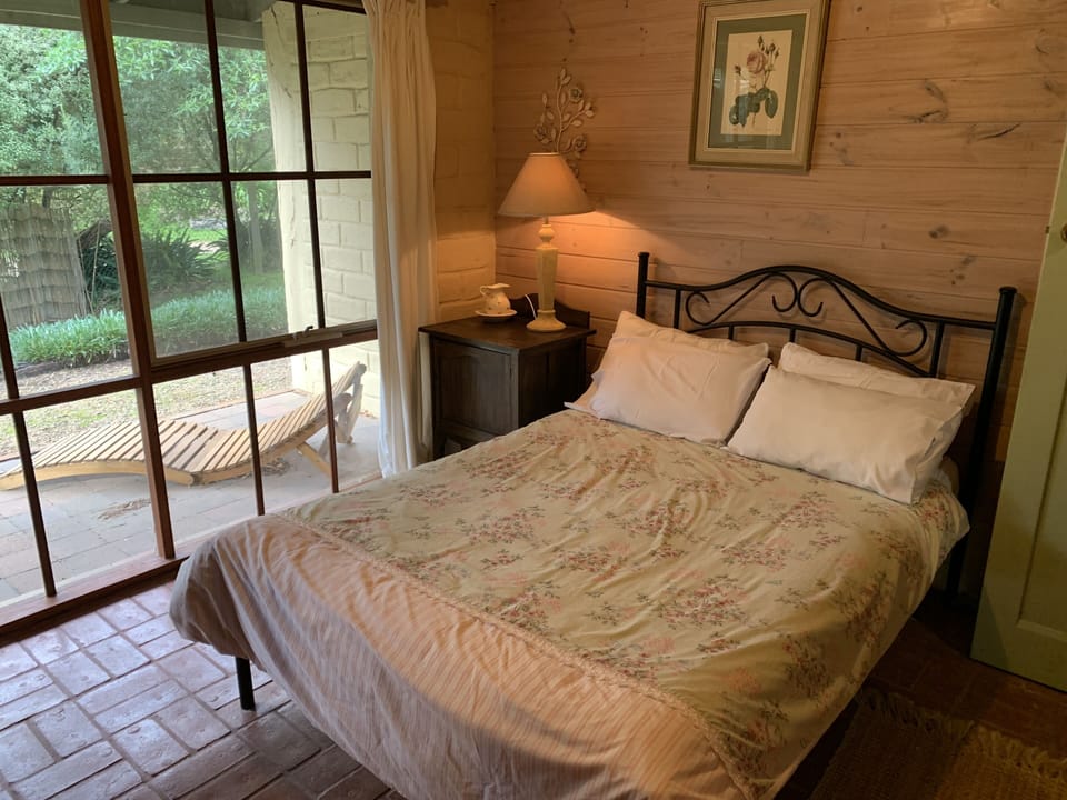 Main level bedroom with double bed