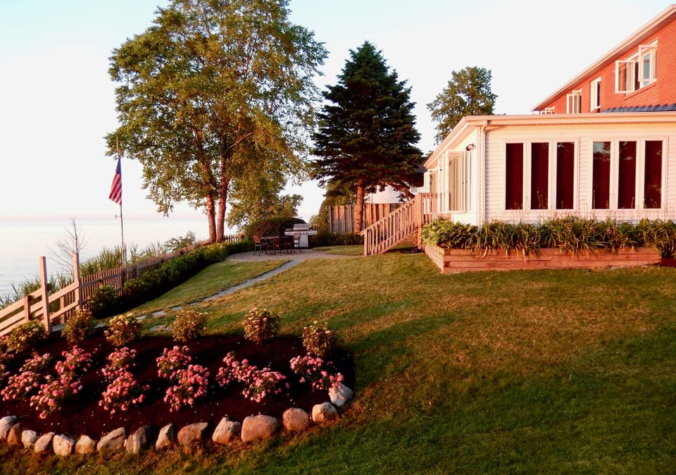 Lake Room addition with patio and grill overlooking lake.