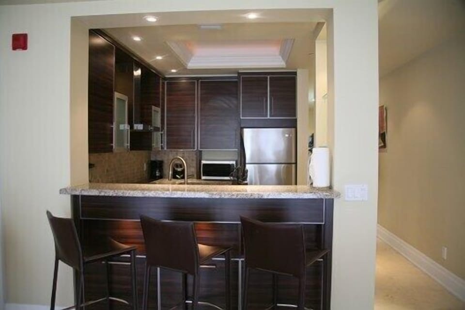 Kitchen bar/island with bar stools
