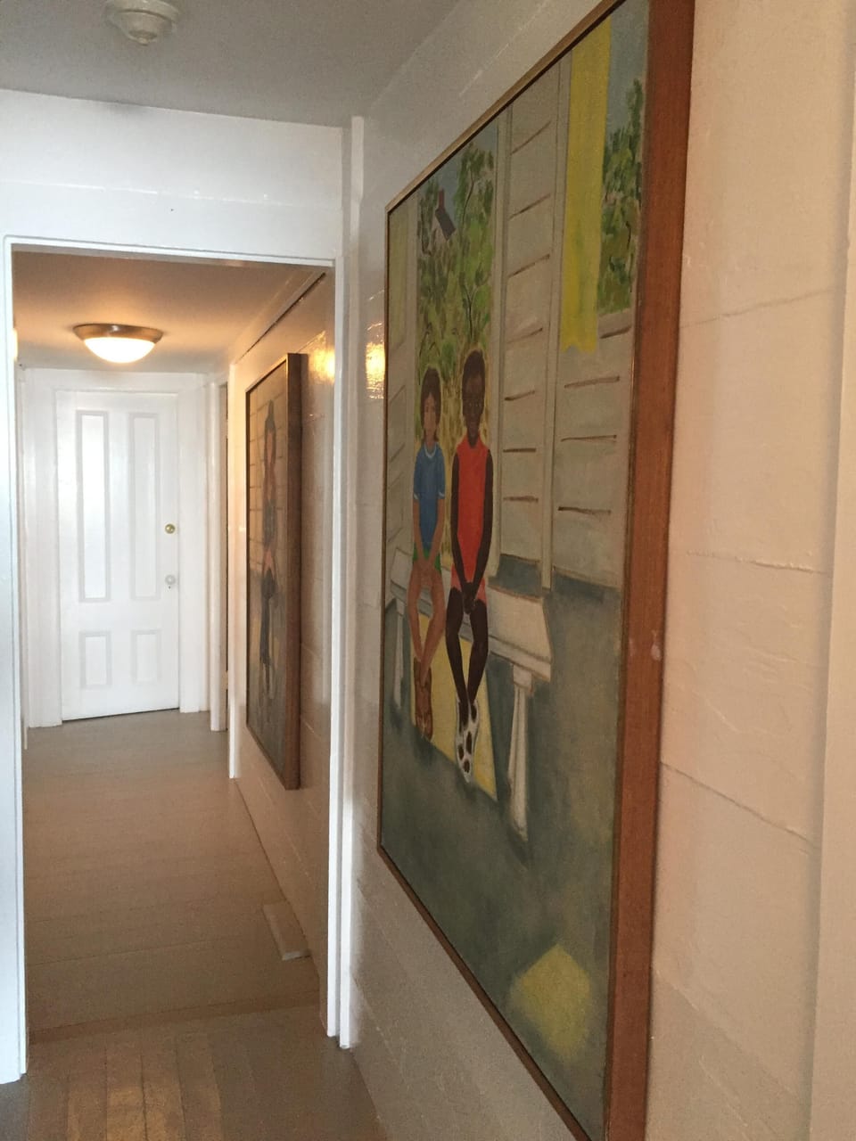 Hallway to extra  bedrooms and guest bath