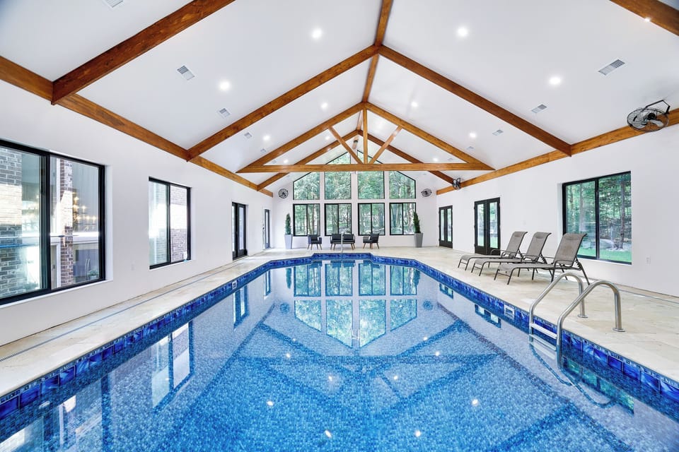 36 foot long inground heated pool with a 9' deep end.