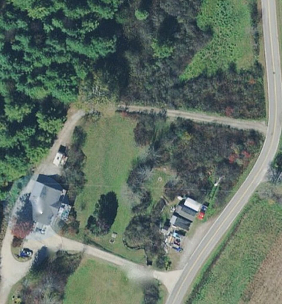 Frontage road of rental property has plenty of space for boats, trailers etc