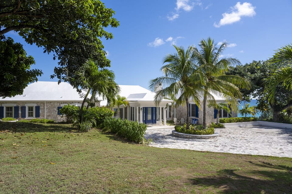 This beautifully restored and modernized estate home of the late Sir Roland Symonette
