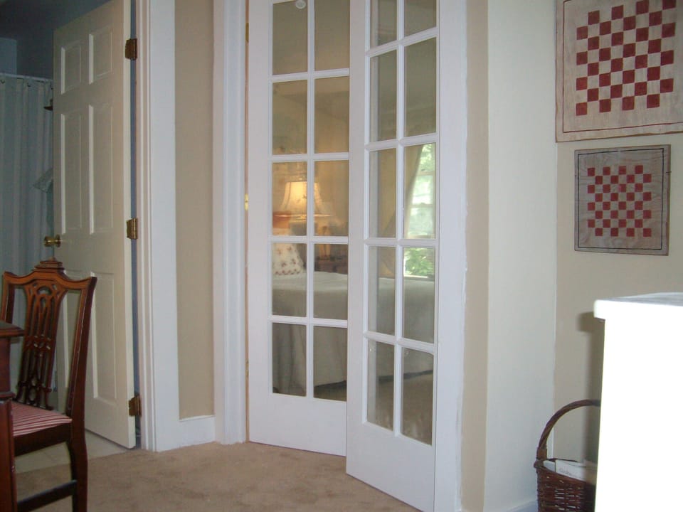New french doors to upstairs bedroom
