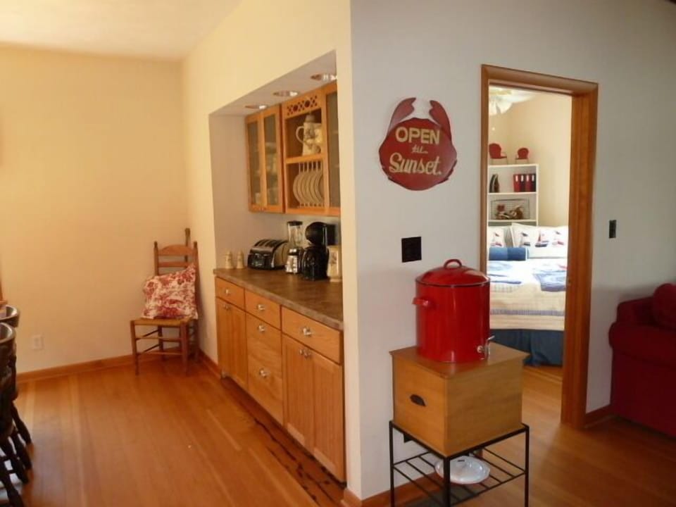 Eat-in area has breakfast side board and china for 8+