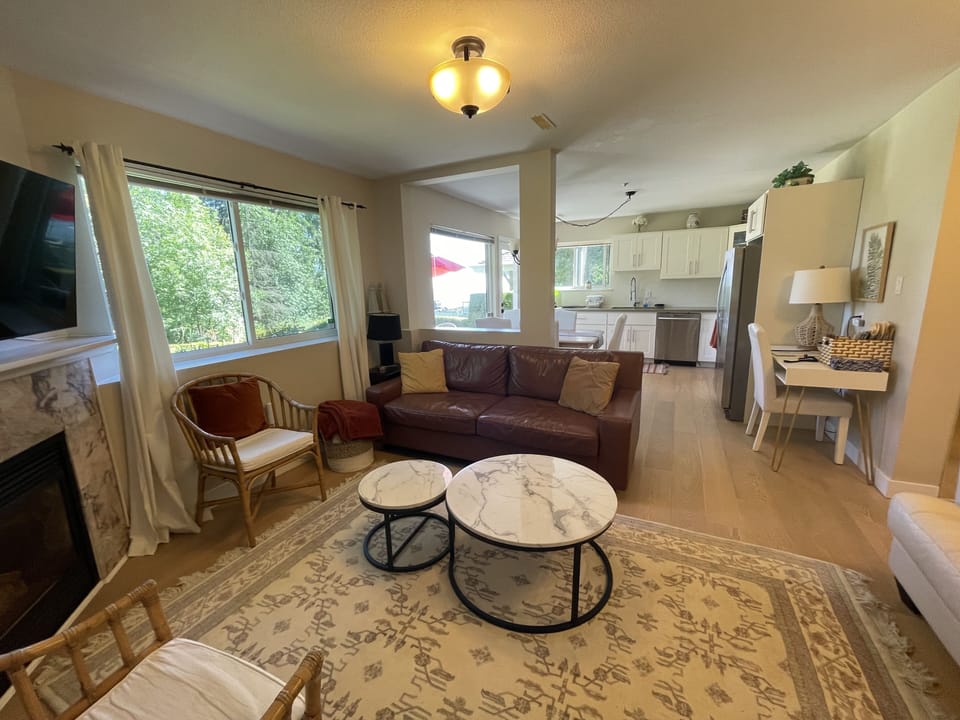 Living room with 2 couches and gas fireplace