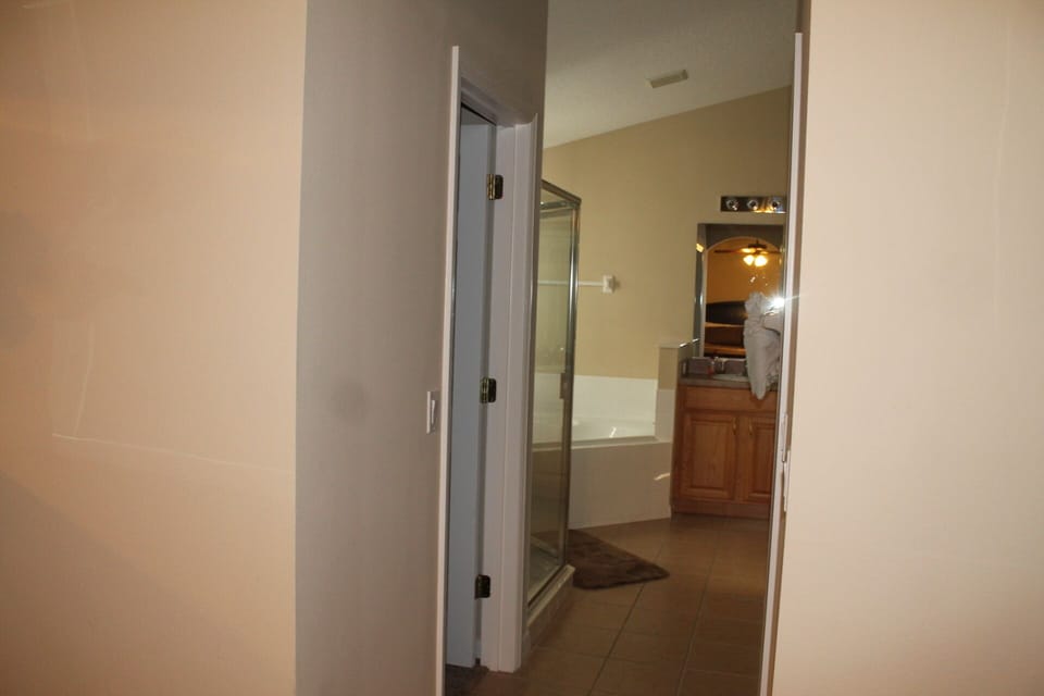 Master bathroom- his and hers walk in closets, vanities. Jacuzzi & shower.