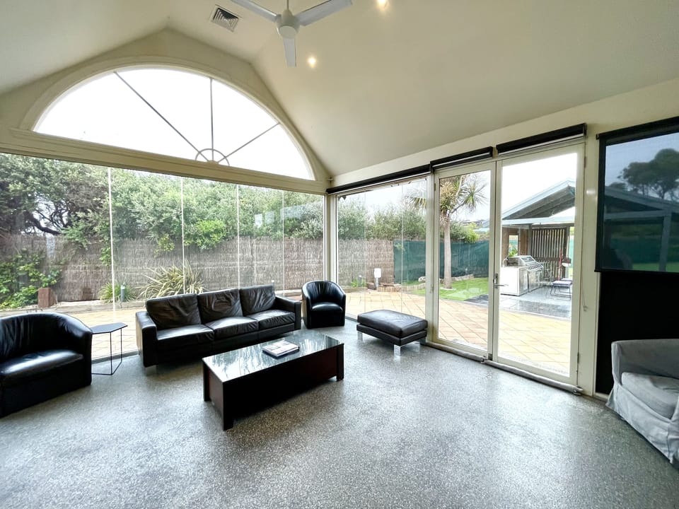 Back Family room with doors to outdoor dining