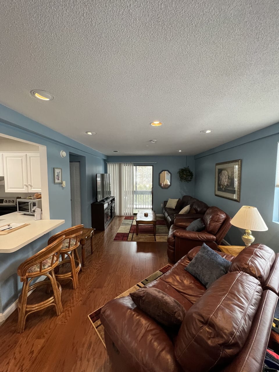 Living room with 72” TV, electric fire place, pull out sofa bed, luv sear n more