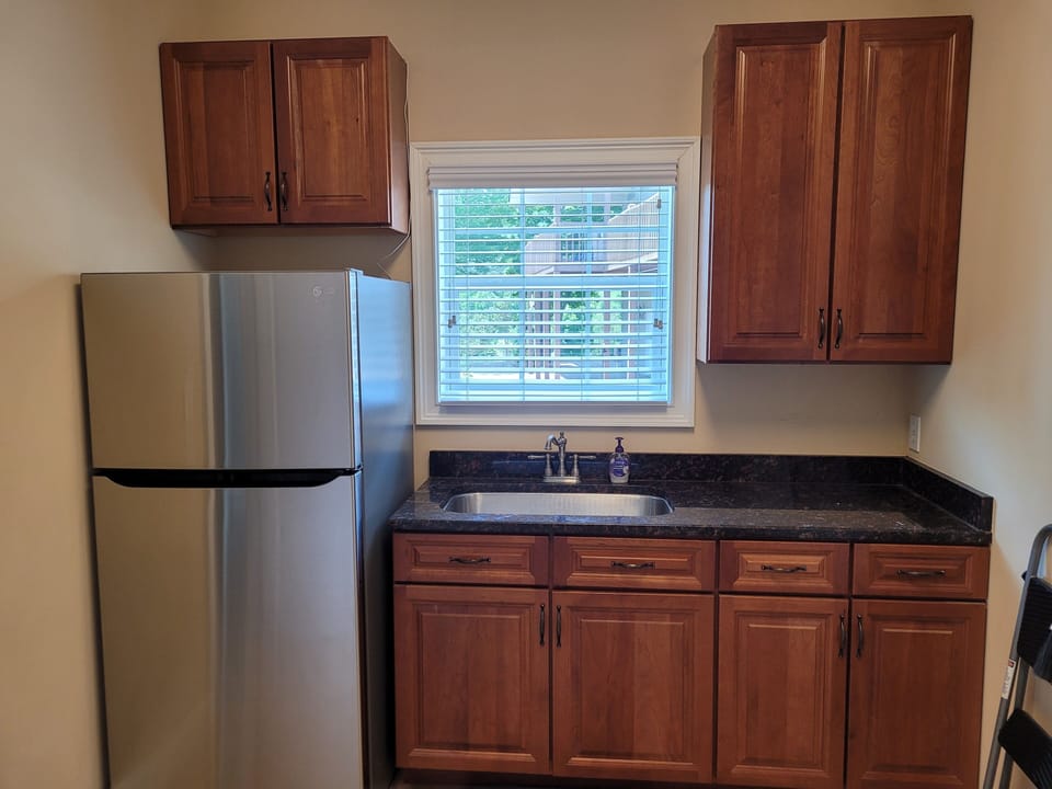 Extra Refrigerator in Laundry Room