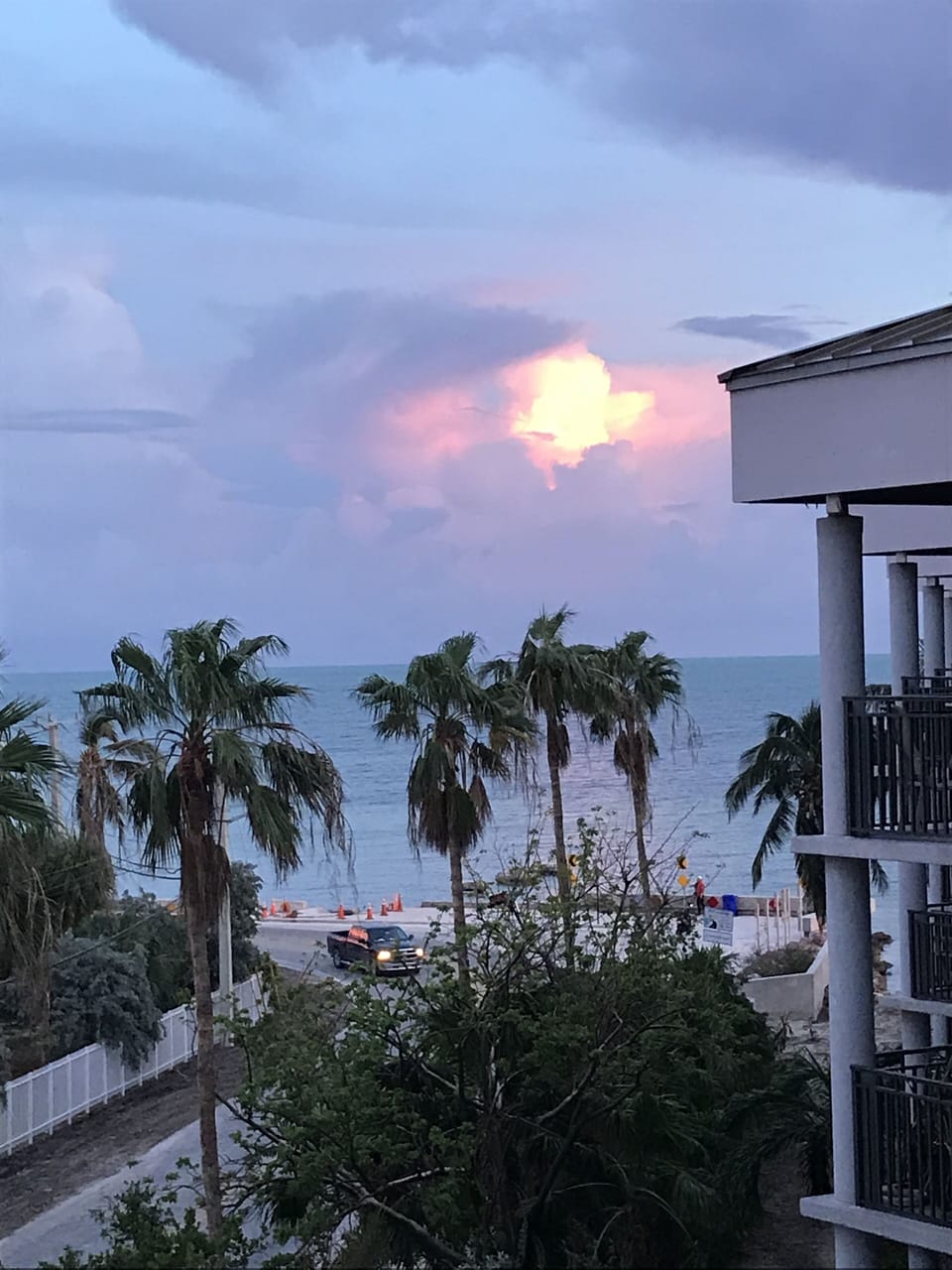 Sunset As Seen From The Balcony - Sun Reflecting Off The Clouds