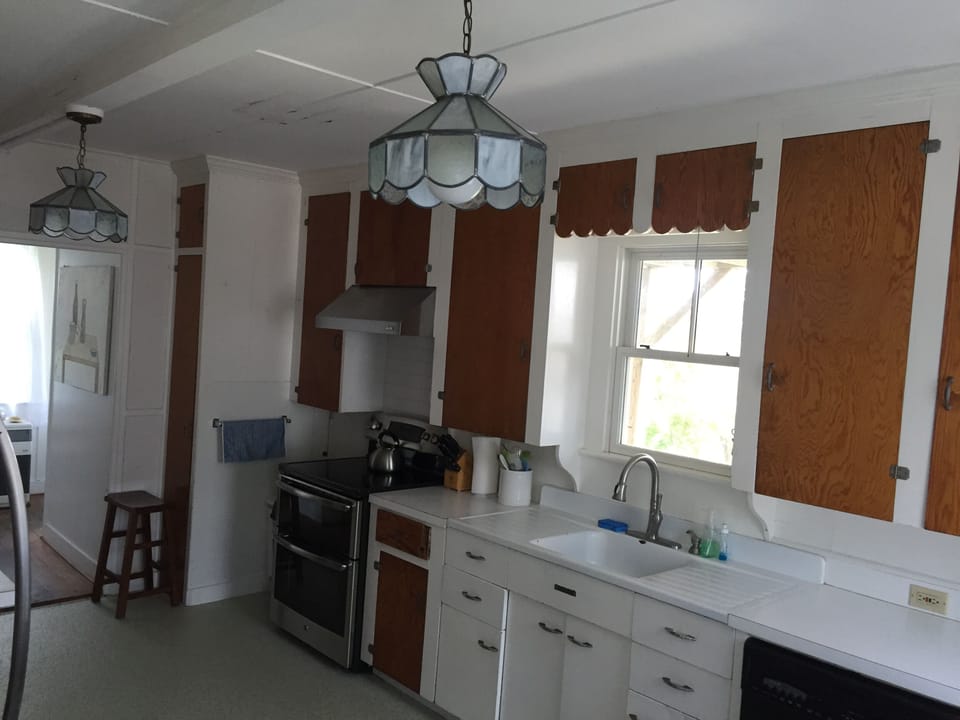 Bright kitchen and mud room 