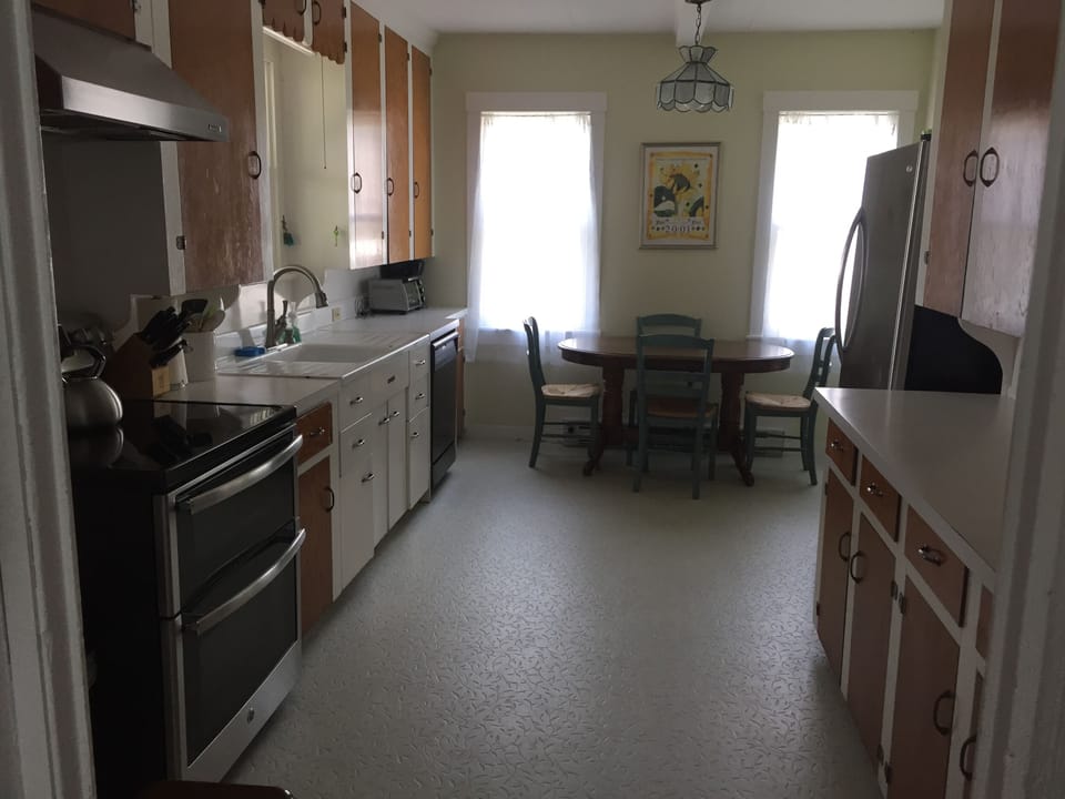 Kitchen has an informal dining nook
