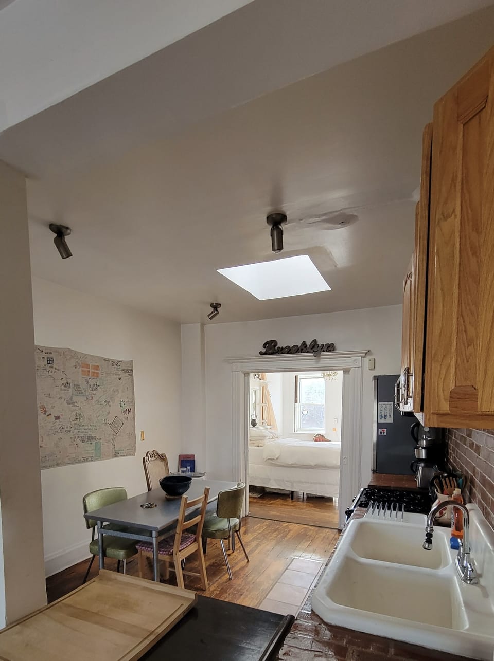 Kitchen and glance at the master bedroom