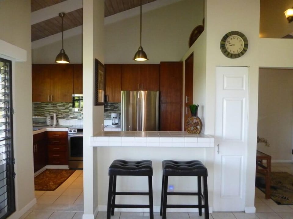 Open Kitchen With Breakfast Bar Adjacent To Dining Area & Lanai w/Electric B'que