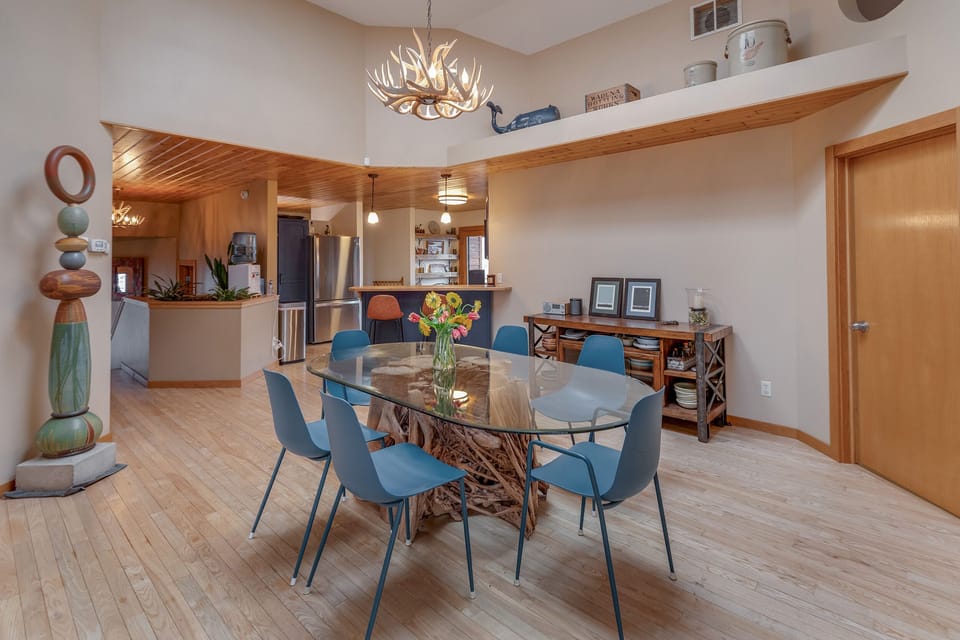 Custom art and table (that can seat 8 comfortably) make this room a favorite.