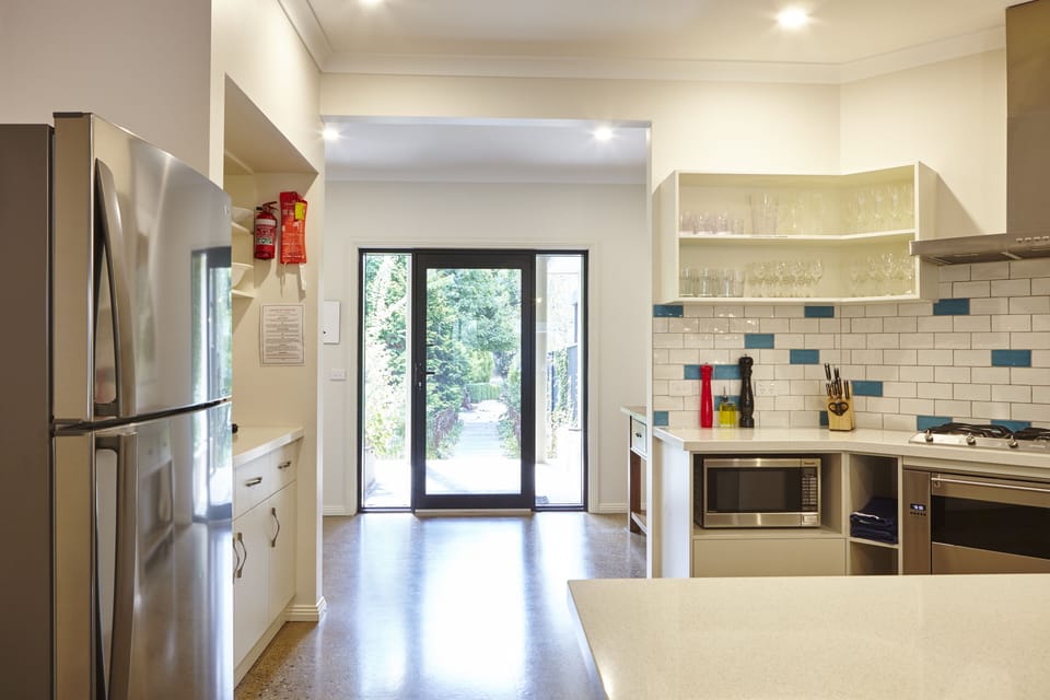 Looking through to the foyer from the kitchen