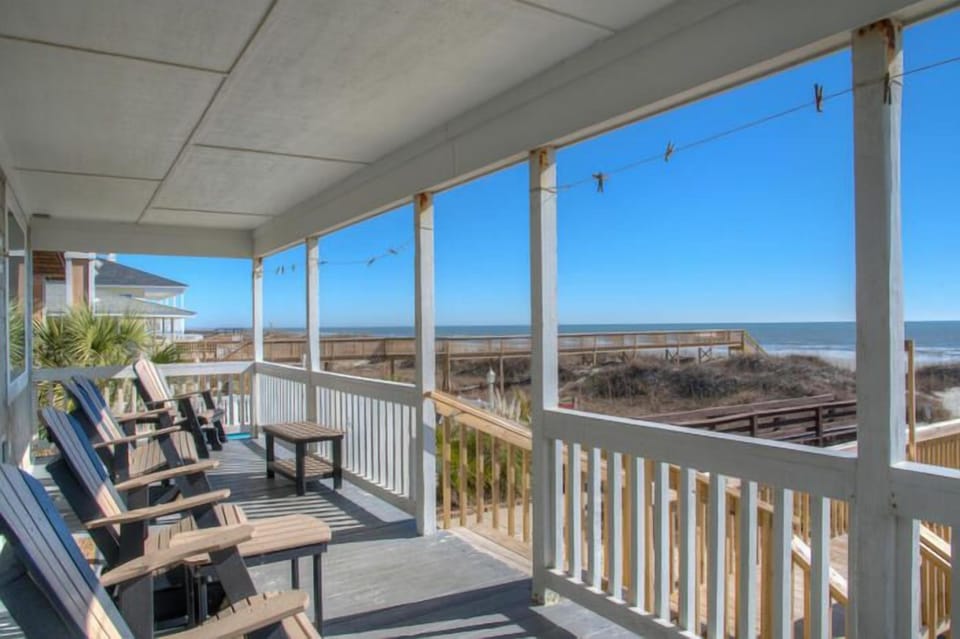 The fully furnished covered porch offers spectacular views.