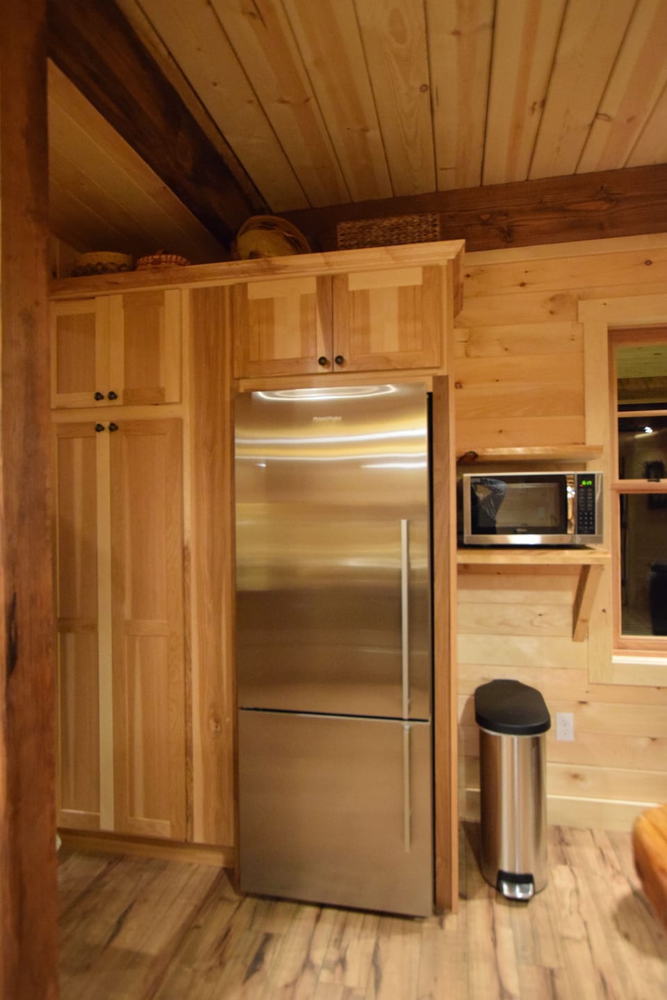 Pantry, Built in Fridge, & Microwave area. Small appliances provided.