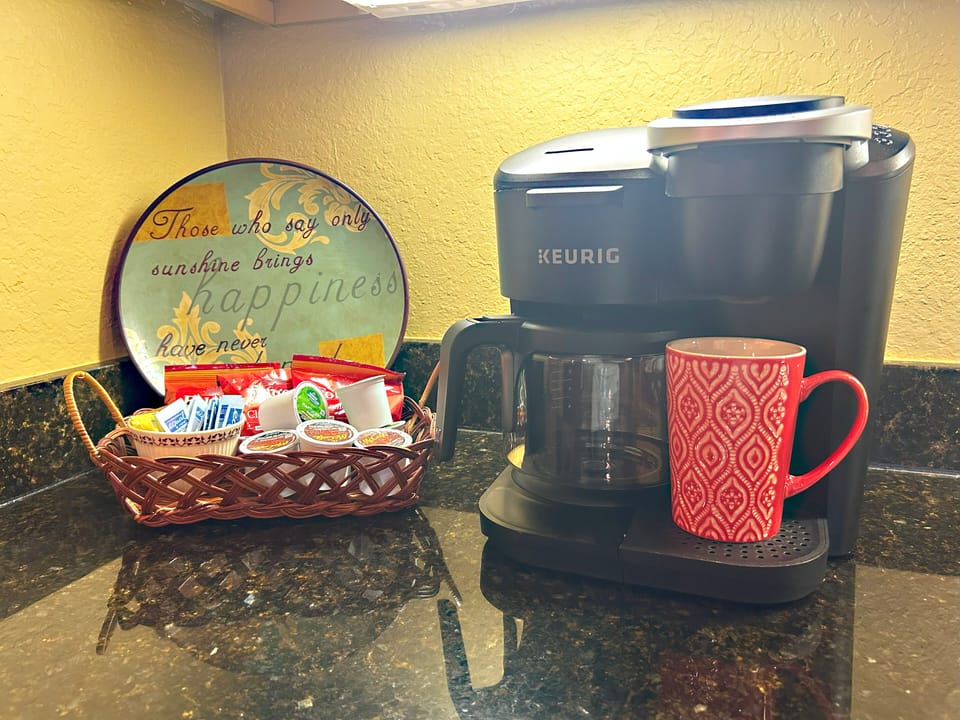 Dual coffee maker (Keurig Pod & Carafe) and coffee starter kit.