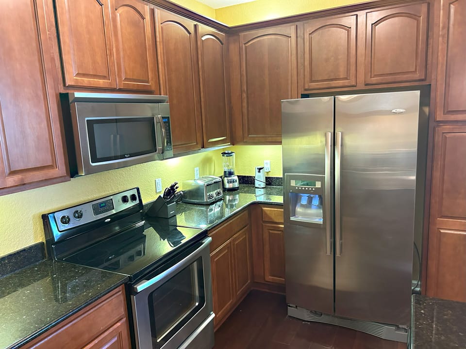 Fully equipped kitchen with stainless steel appliances