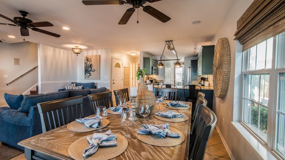 Seating for 8 adults at the table with3 additional barstool seats at the counter