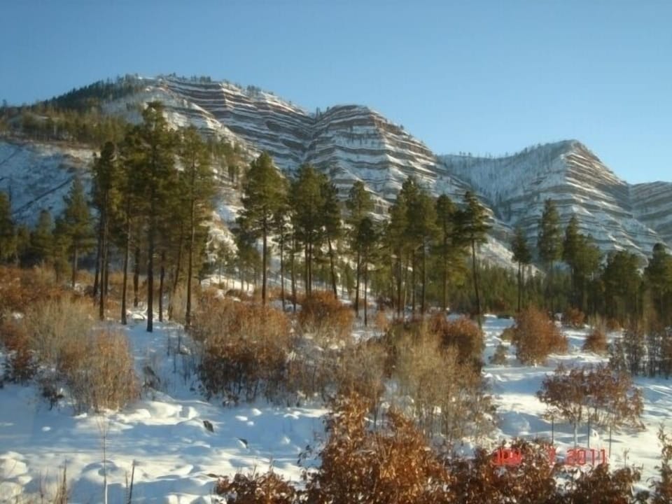 Red bluffs of Missionary Ridge directly behind the Lodge