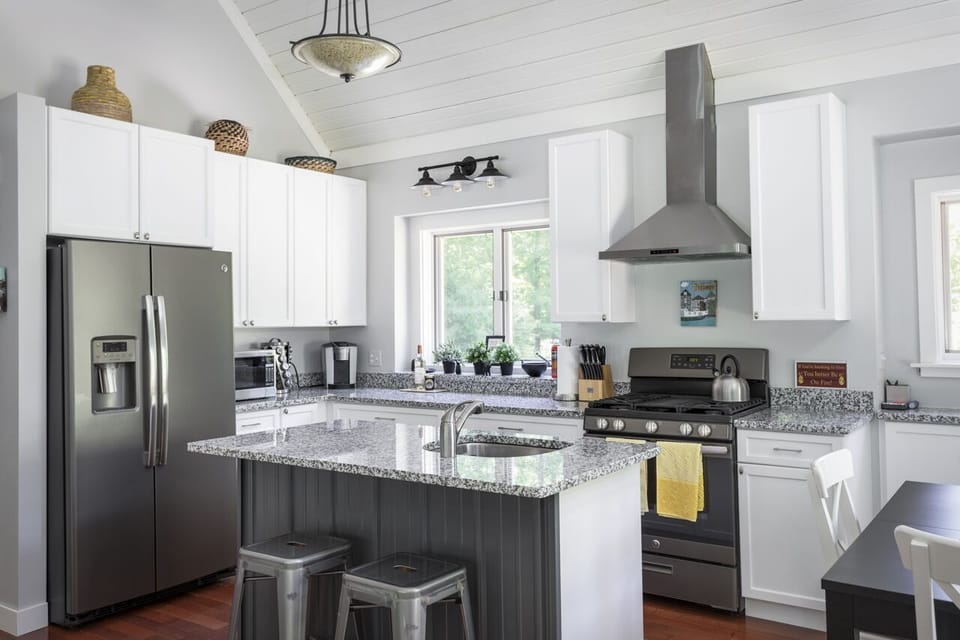 Modern, updated, fully stocked kitchen with slate appliances.