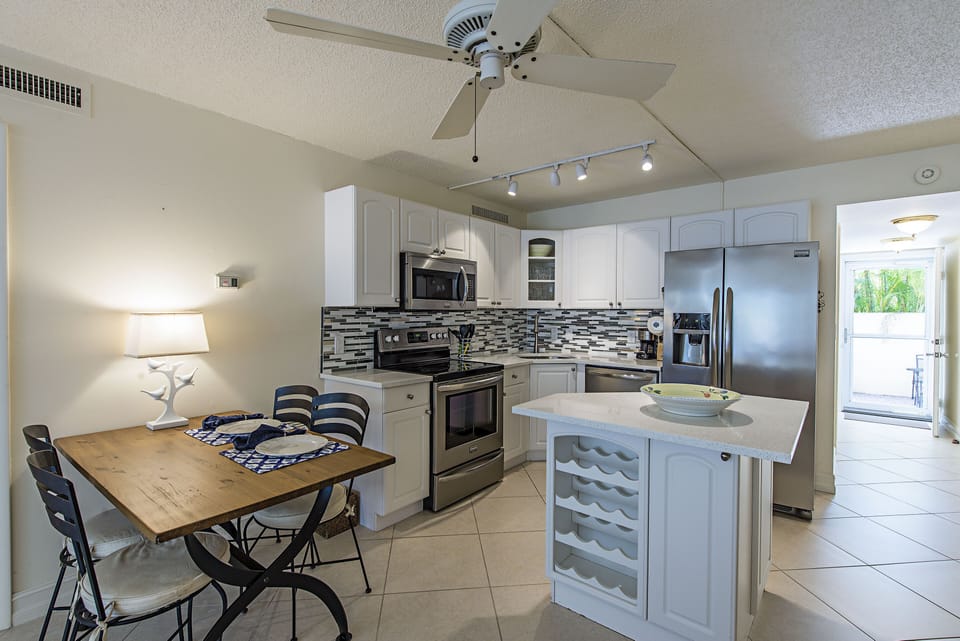 Kitchen, dining table and kitchen island