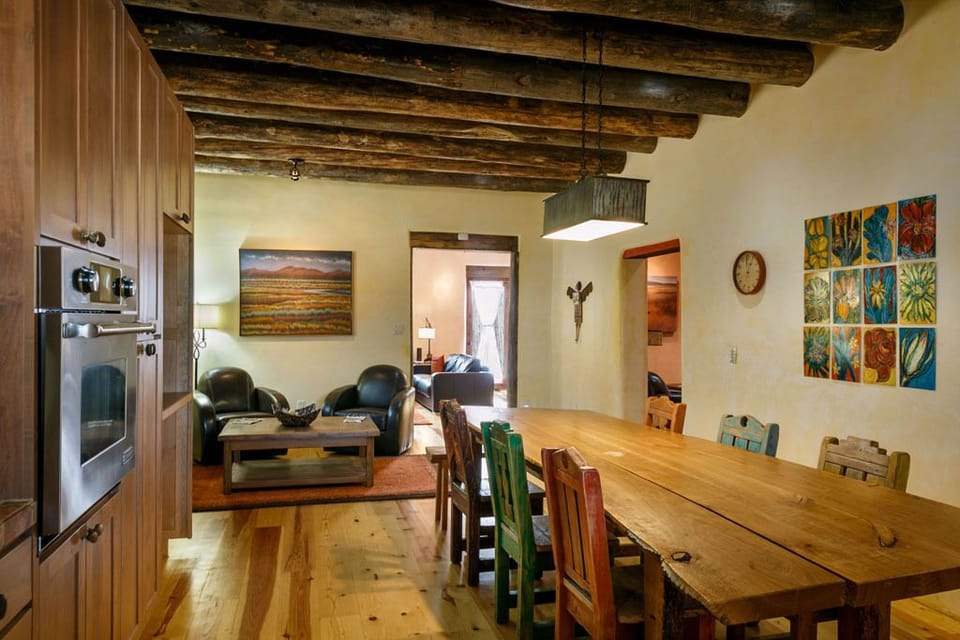 10 ft long kitchen table and  reading area in the kitchen.