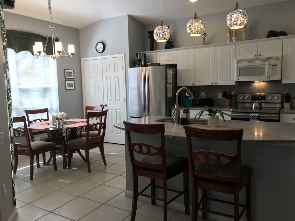 New lighting and quartz countertops.  Fridge is big with filtered water.
