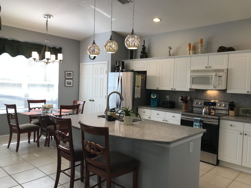 We hope you love our new kitchen! Light and fully stocked for cooks!