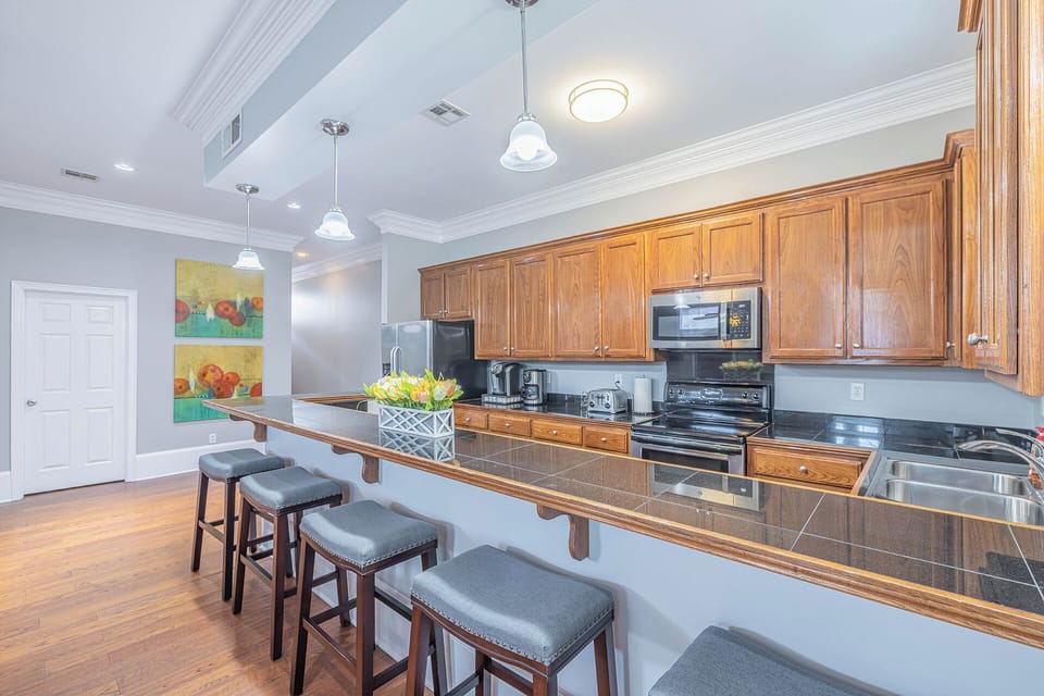 Right view of kitchen with cabinets and granite counter tops