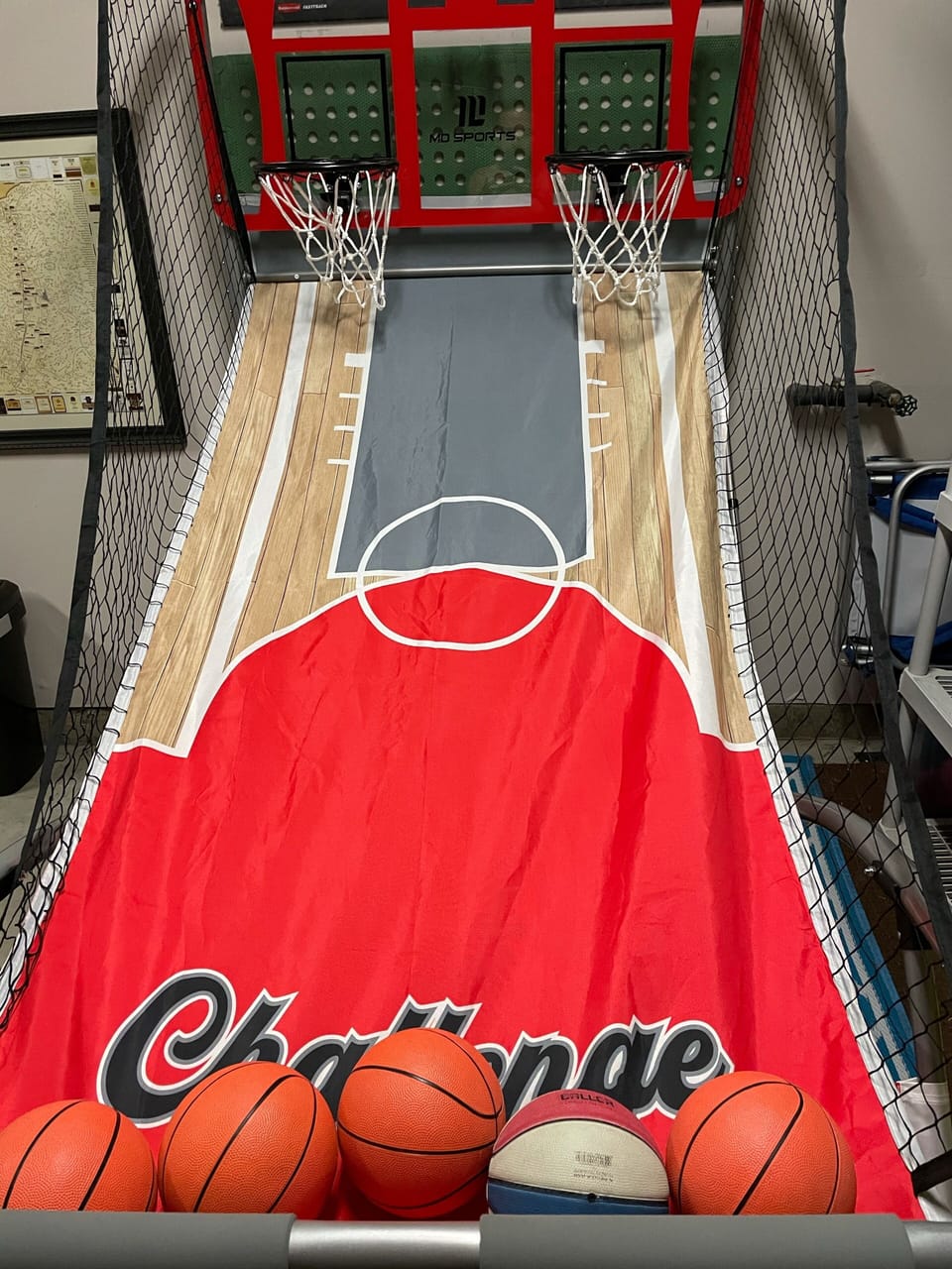 Pop A shot basketball hoop in garage