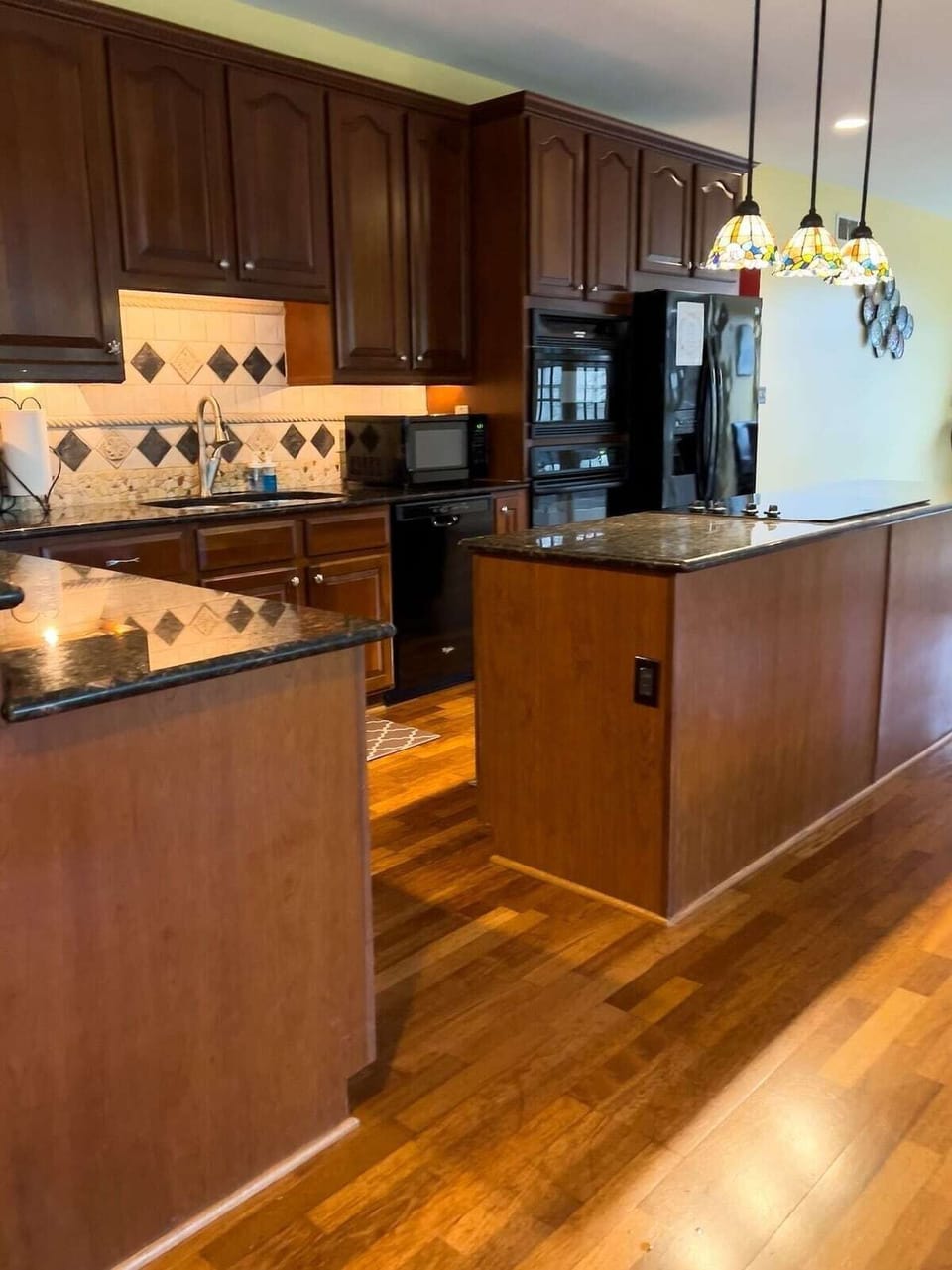 One of TWO Full Kitchens