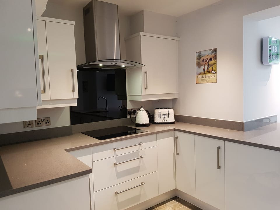 Fully equipped kitchen with induction hob
