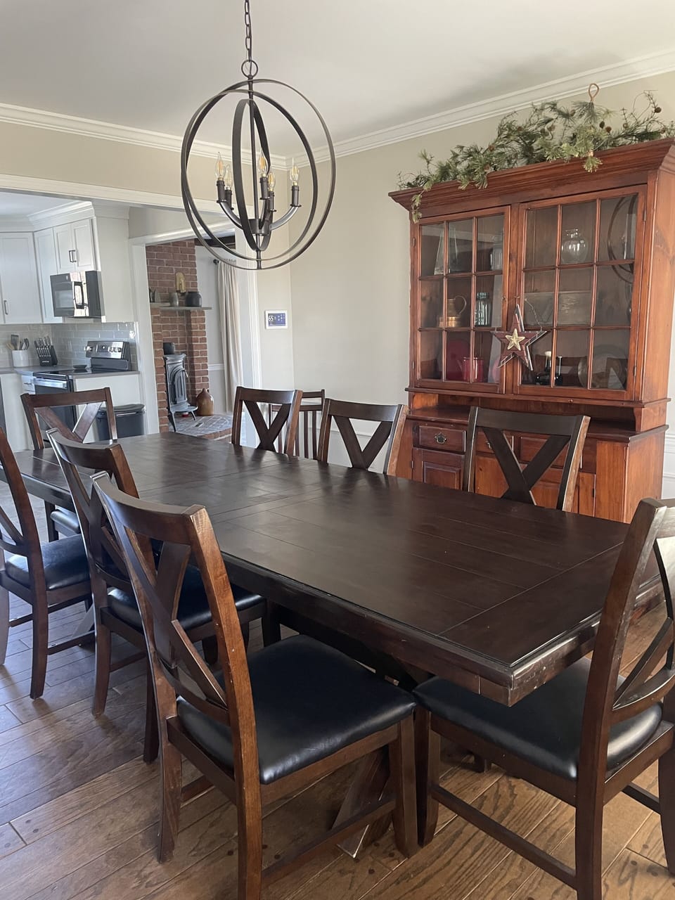 Dining room with a large table and seating for up to 10.