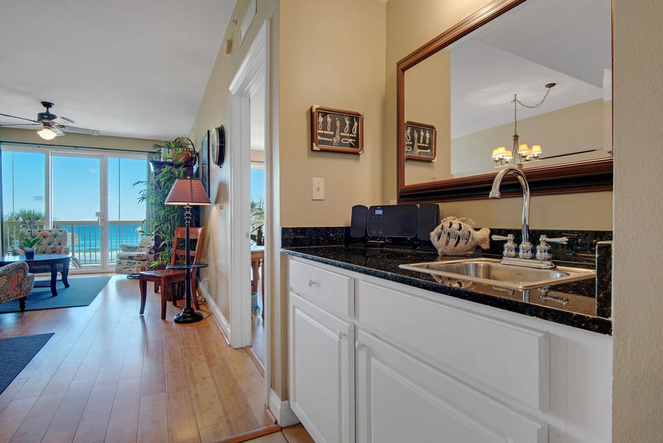 Wet Bar with sink, mirror  and storage