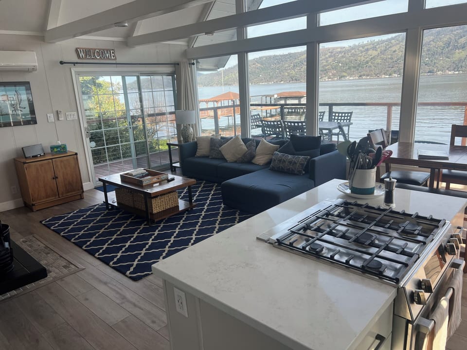 Gas cooktop island with down draft exhaust fan.