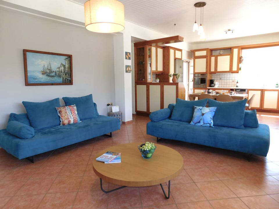 Villa Almarine upstairs open-plan living room and kitchen.