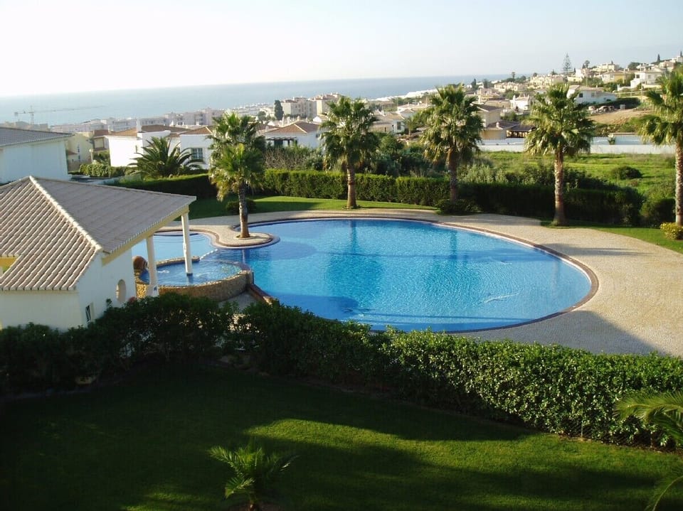 The pools  and the sea from the house terrace