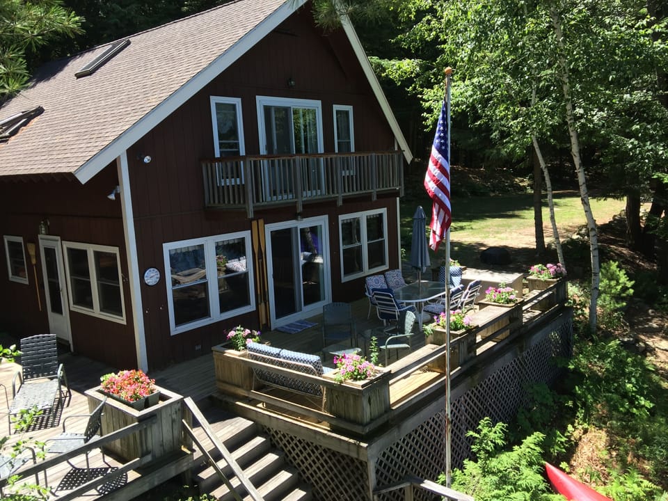 Living area and deck at lake level.  Bedrooms and 1/2 bath 2nd level.