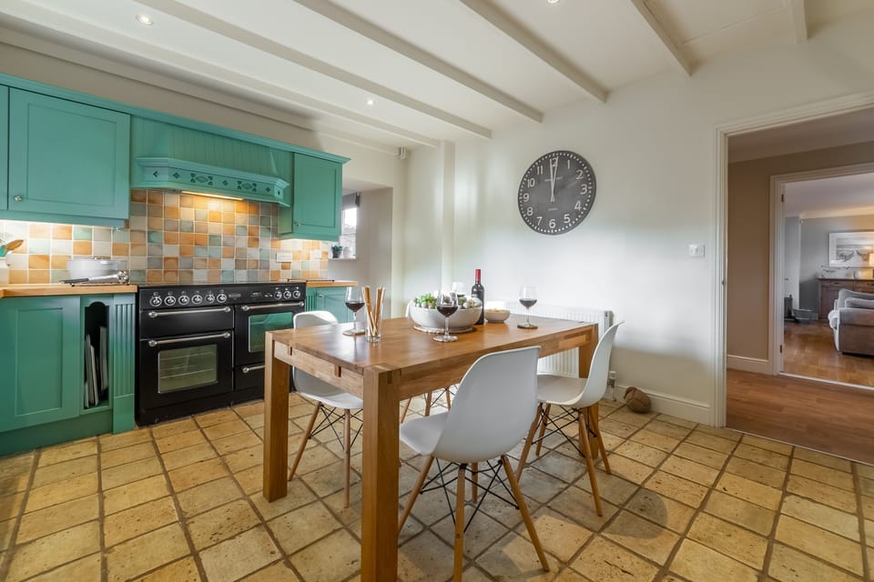 Ground floor: The kitchen has an electric range oven