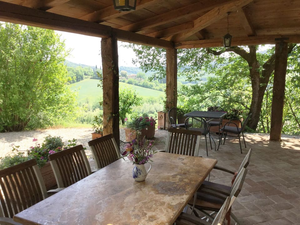 Loggia dining terrace adjacent to kitchen