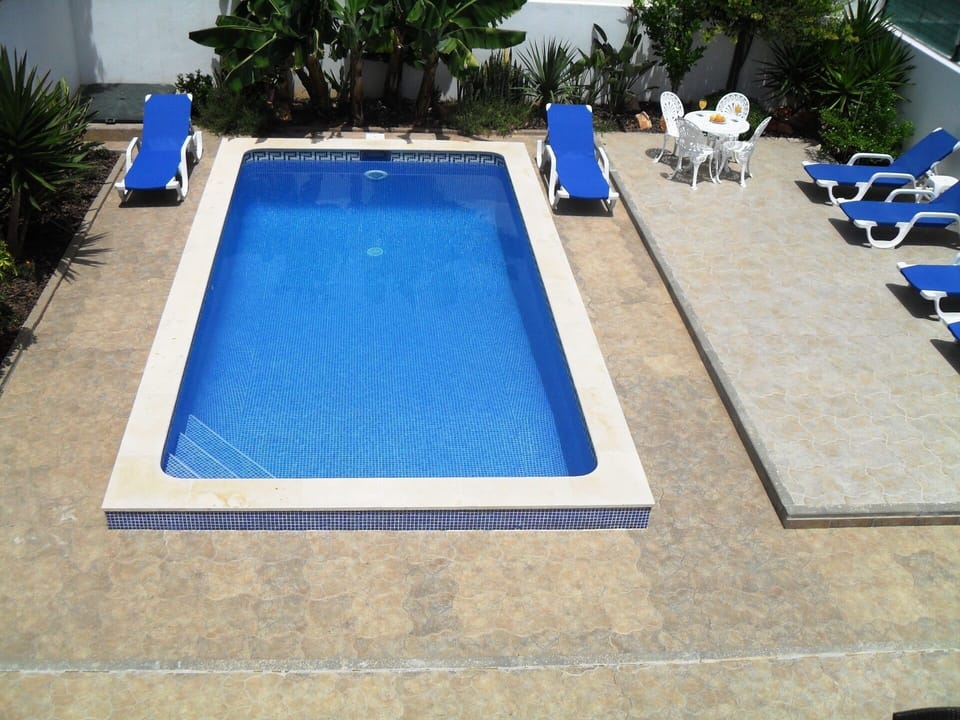 Stunning Views of the Pool, Sun Terrace & Tropical Garden from the lounge