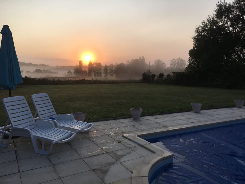 September dawn break over the rear garden
