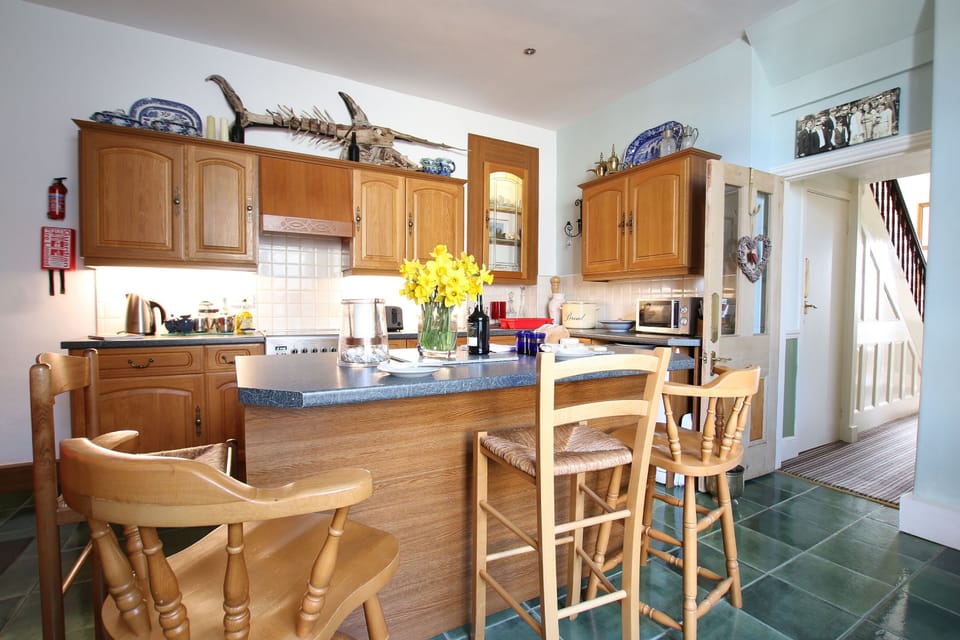large family kitchen which leads to utility room